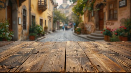 Empty wooden table in the corner of urban european street, blur background with passerby table - obrazy, fototapety, plakaty