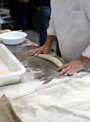 Fototapeta premium professional baker making sourdough bread