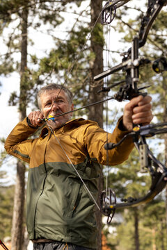 Portrait of a man with a bow and arrow