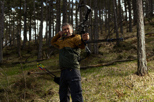 Portrait of a bowman preparing to shoot
