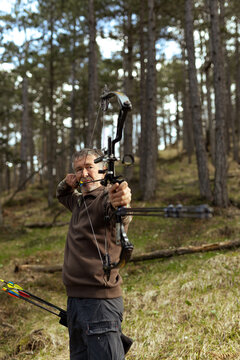 Portrait of an archer focusing on a target