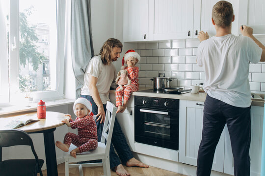 LGBT Family spending morning time together . Christmas Holidays.