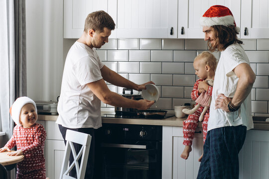 LGBT Family spending morning time together . Christmas Holidays.
