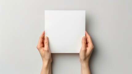 Hand holding white blank paper isolated white background. AI generated
