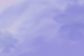 Obraz premium Abstract blue and white blurred grainy gradient background texture with shades of flowers