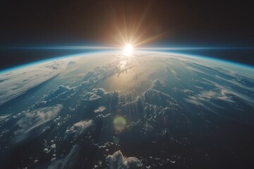 A view of the Earth from space, with a bright blue planet surrounded by a dark sky. The stars are...