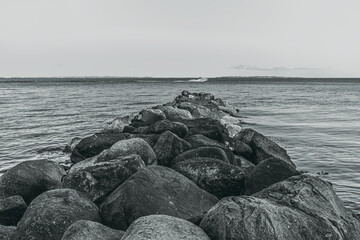 stone breakwater by the sea