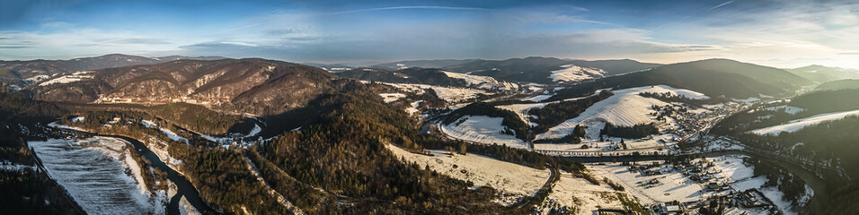 Panorama aerial view of the Poprad Landscape Park on the Poprad River in Beskid Sadecki on a sunny,winter day.