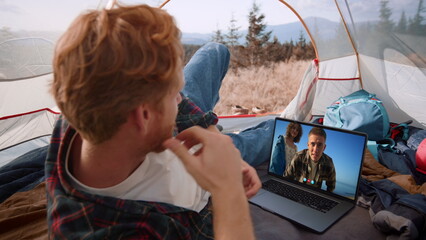 Traveling people video call in conference app. Closeup guy resting in mountains