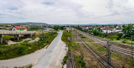 Fototapeta premium Panoramic view from the bridge on the track through which the high-speed trains pass. Railway from Skopje to Veles.