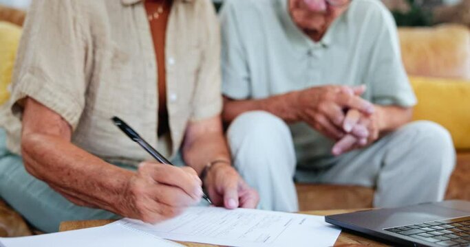 Senior people, pen and writing with documents for life insurance, loan application or financial budget. Retirement, pension and teamwork with paper for mortgage bills, will information or planning
