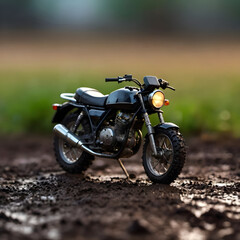 Macro shot, close up - tiny retro motorcycle in nature in fresh morning atmosphere. Blur in the back.