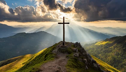 Fotobehang Divine Light: Cross on Mountain Peak Bathed in Sunrays, Easter Sunday, Sacrifice, redemption, salvation, eternal life © The Perfect Moment