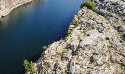 View from ancient Roman bridge Pont du Gard on Gard river near Vers-Pont-du-Gard town in France