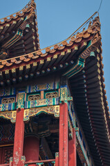 Obraz premium Architectural details of pavilion roof in Yonghe Temple commonly called Lama Temple in Beijing, China