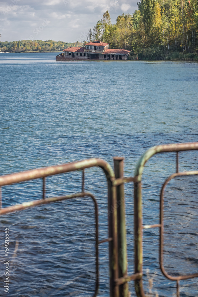 Wall mural Old floating restaurant seen from marina in Pripyat ghost city in Chernobyl Exclusion Zone in Ukraine