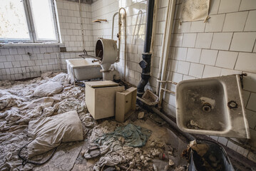 Baths of Hospital MsCh-126 in Pripyat ghost city in Chernobyl Exclusion Zone - obrazy, fototapety, plakaty