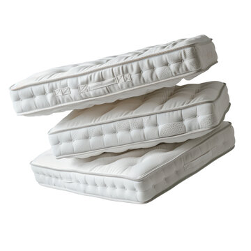 Stack of white mattresses isolated on a white or transparent background. Spring mattresses close-up, side view. Graphic design element on the theme of interior.