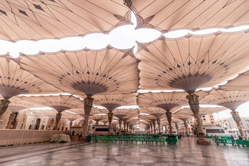 Shading umbrellas of the Prophet's Mosque in Al Haram area of Medina, Saudi Arabia