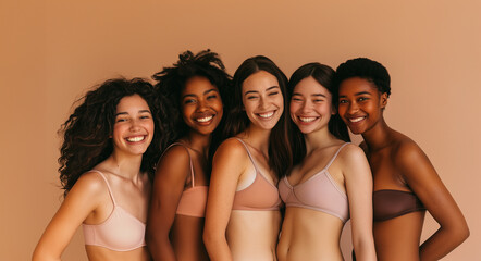 Women in underwear lingerie smiling confident happy, posing together. Young women models looking at camera, body and skin beauty or people diversity studio shot