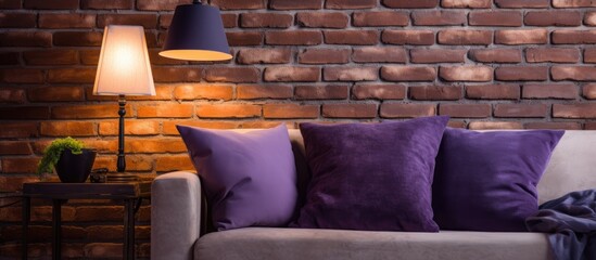 Decor of a room with a brick wall, purple throw pillow, and lamp