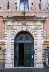 Fototapeta na wymiar Door of Palazzo Cardinal Cesi in Rome, Italy