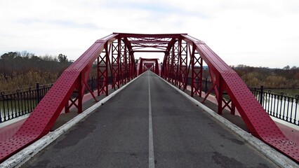 metal bridge over the tajo river Talavera de la Reina red engineering steel rivets