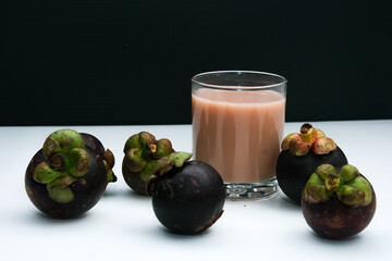 Mangosteen juice is made from the mangosteen fruit and its seeds which are blended until smooth....