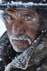 Portrait of an indigenous trapper in winter time. 