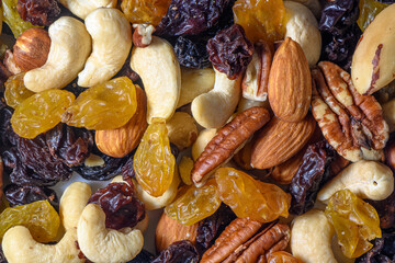 background with a cashew, hazelnuts, raisins and peanuts. Mixed nuts and raisins texture.9