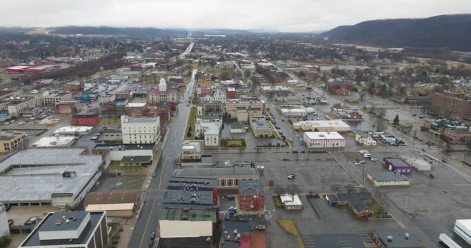 Elmira, NY, USA - 03-02-2024 - Cloudy winter aerial image of the downtown area in the City of Elmira, NY, year round activity. 