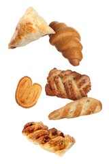 Different tasty puff pastries falling on white background