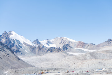 The beautiful scenery of snow-capped mountains along the Duku Highway in Xinjiang, China