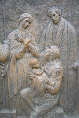 The Presentation of Jesus – Fourth Joyful Mystery of the Rosary. A relief sculpture on Mount Podbrdo (the Hill of Apparitions) in Medjugorje.