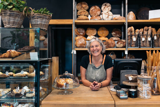 Cheerful female baker portrait