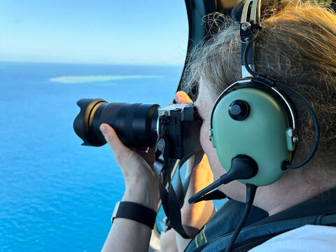 Photographer in helicopter 