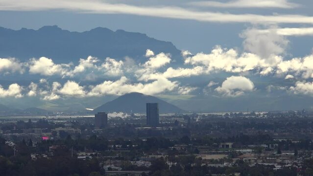 CALIFORNIA - 2.22.2024 - Excellent time-lapse footage of rain clouds moving over a city in southern California.