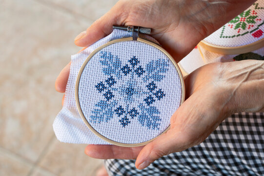 Handmade cross-stitch Christmas decoration