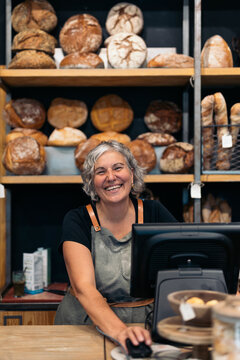 Cheerful female baker portrait