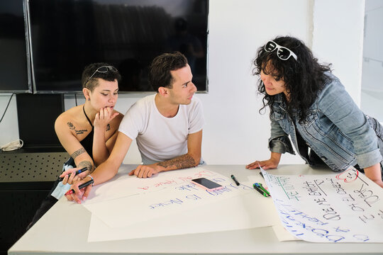 Group Of People Making Protest Signs