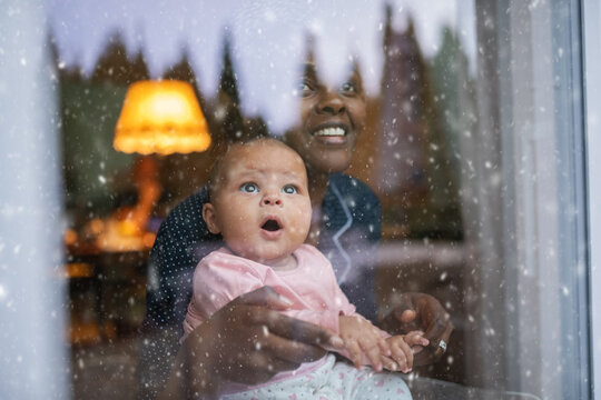 Shocked baby watching snow