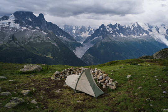Camping Tent Against Mountain Peaks