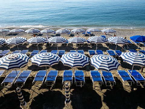 Beach umbrellas in Cinque Terre, Italy