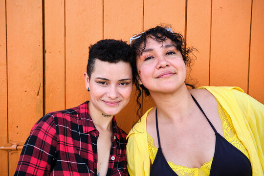 Confident Friends In casual Clothes With Curly Hair - Powered by Adobe