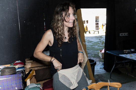 Fashion designer holding panties lo-fi direct flash