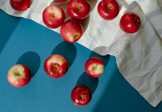 red apples on a blue background
