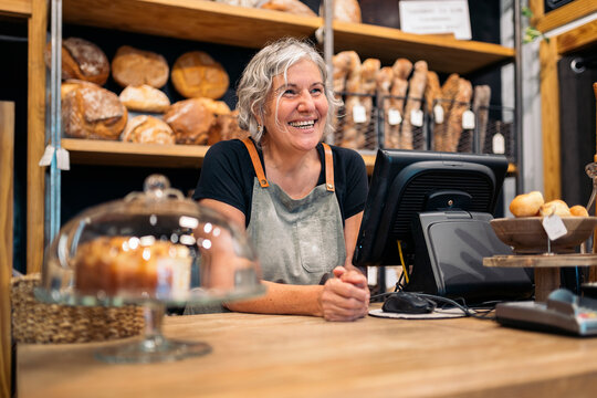 Cheerful female baker portrait