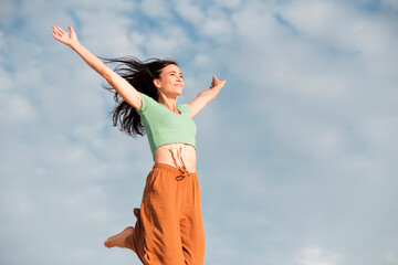 Woman in the air with happy face expression