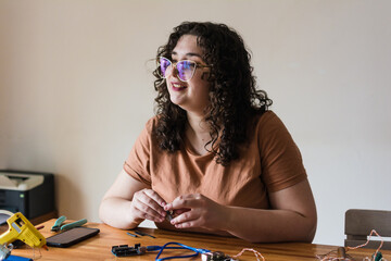 Woman in electronics project