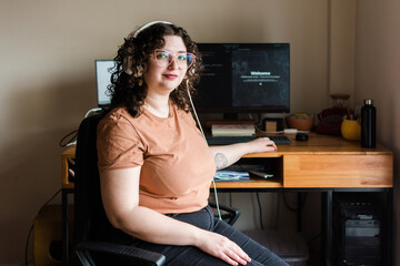 Proud, confident woman working in computer science portrait